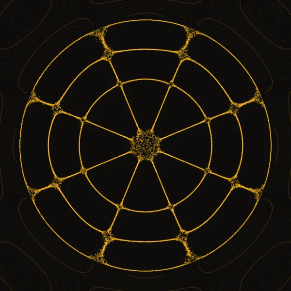 Gold sand on a round black plate, gathered in lines and rings.